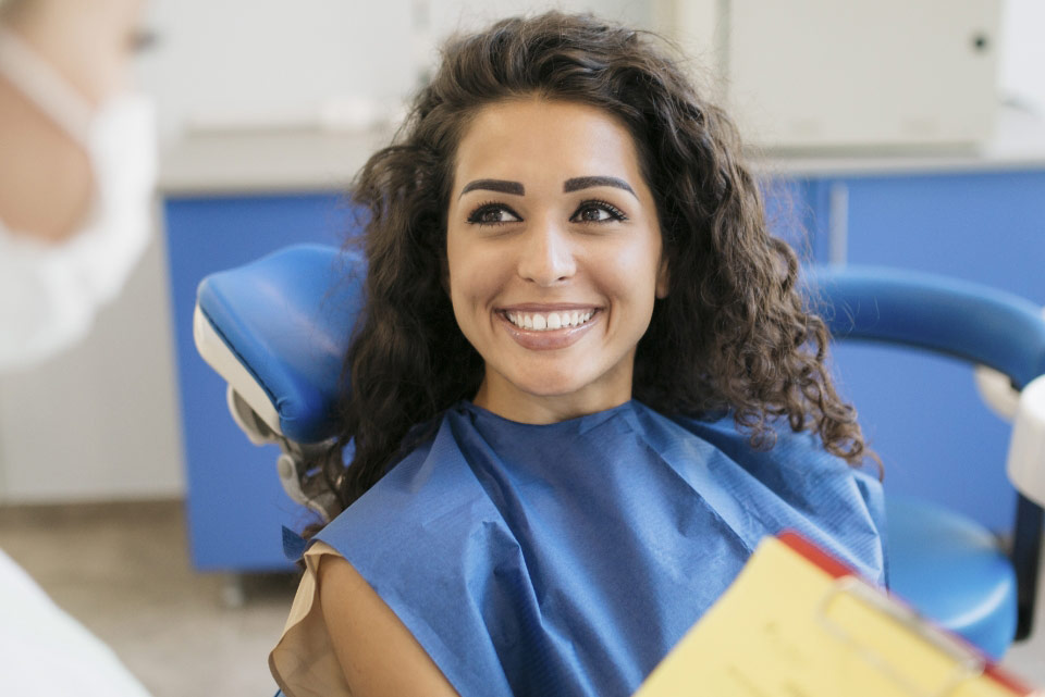 yound-woman-smiling-in-dental-chair-at-cornerstone-dental