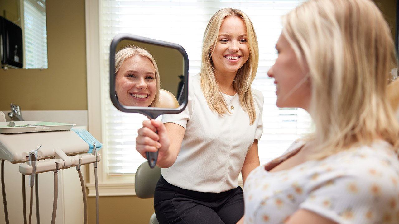 Dr. Hewitt with a patient at Cornerstone Dental