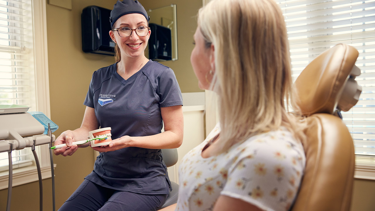 A Cornerstone Dental Hygienist with a patient