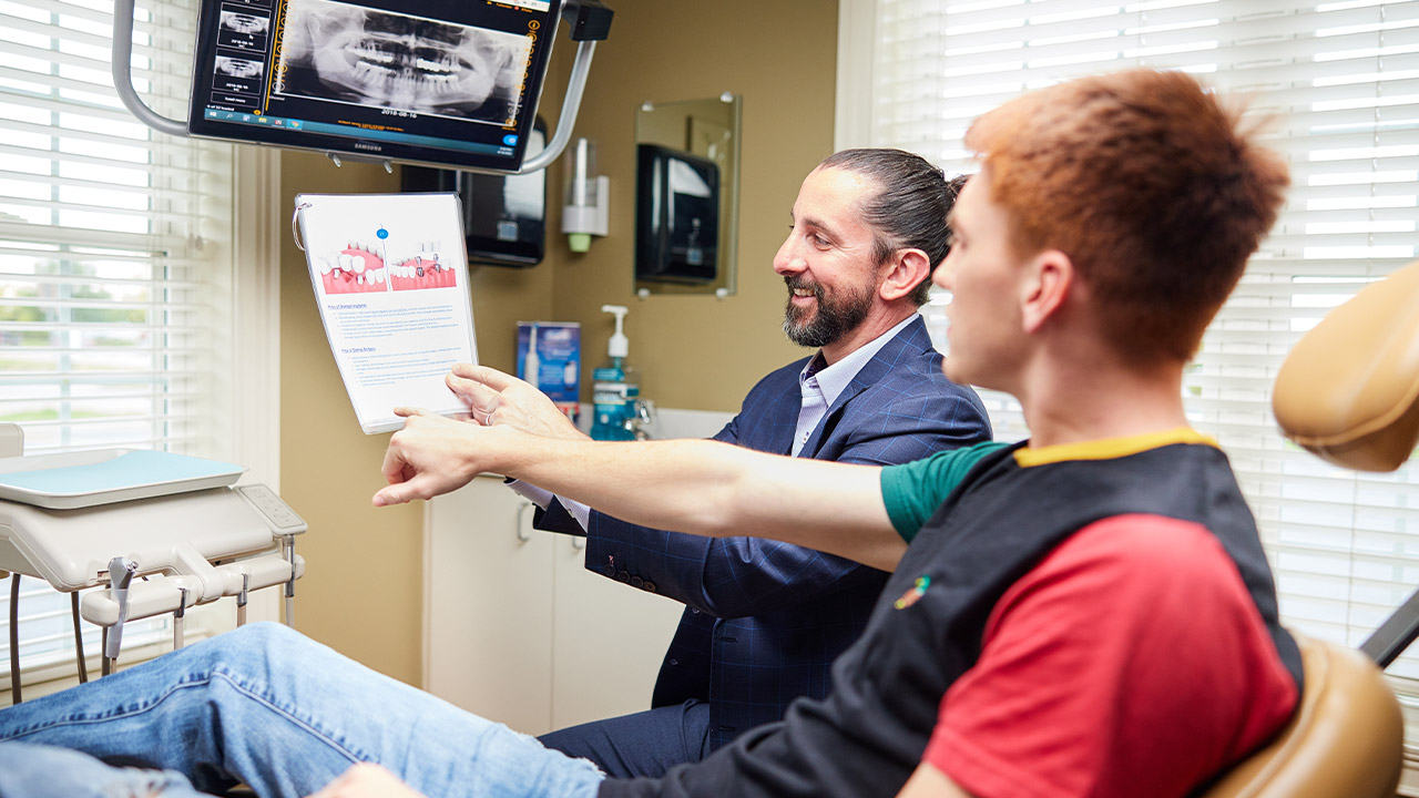 Dr. Malatesta with a patient at Cornerstone Dental